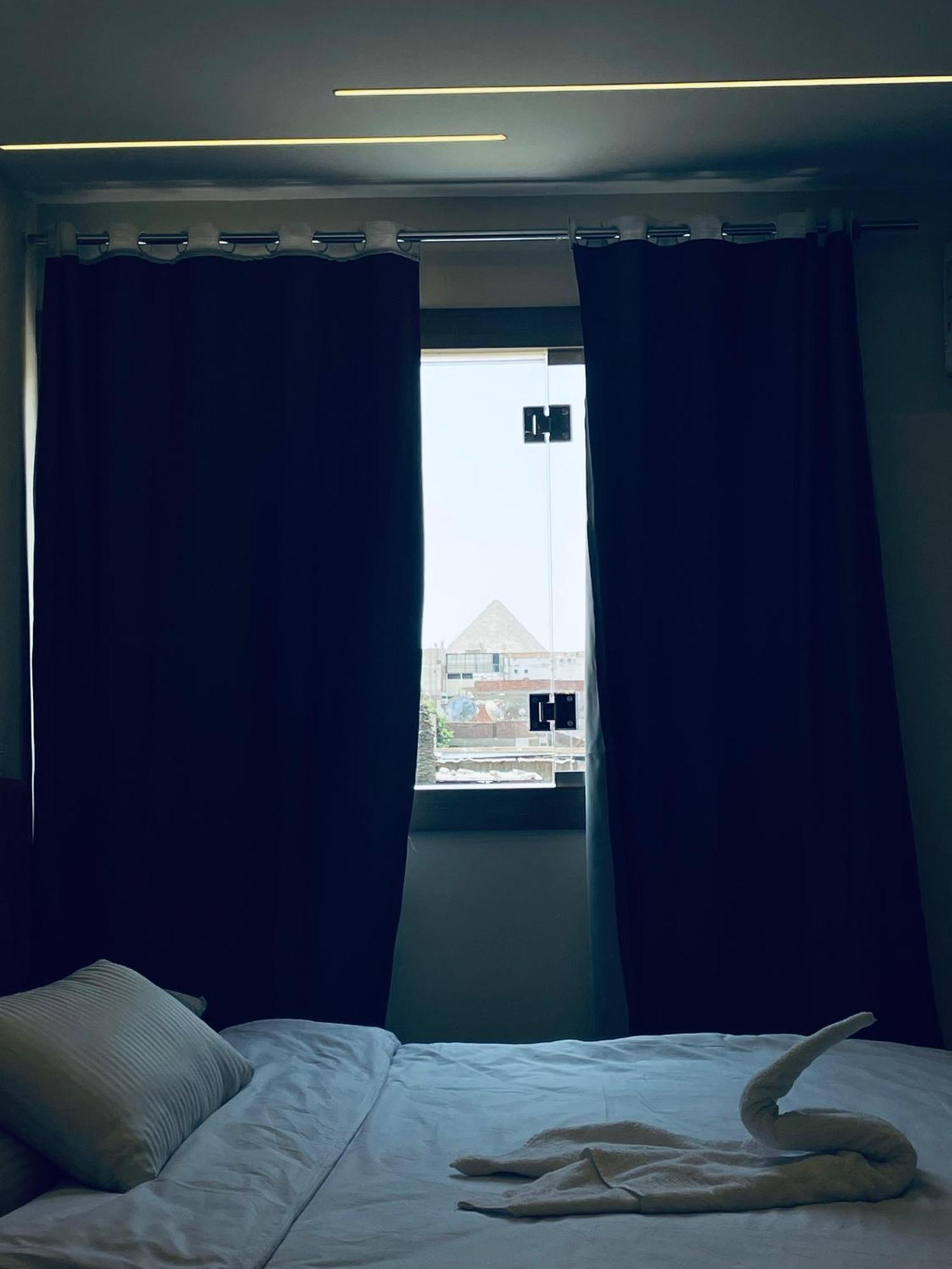 The View Pyramids Hotel Kafret el-Gabal Exterior foto